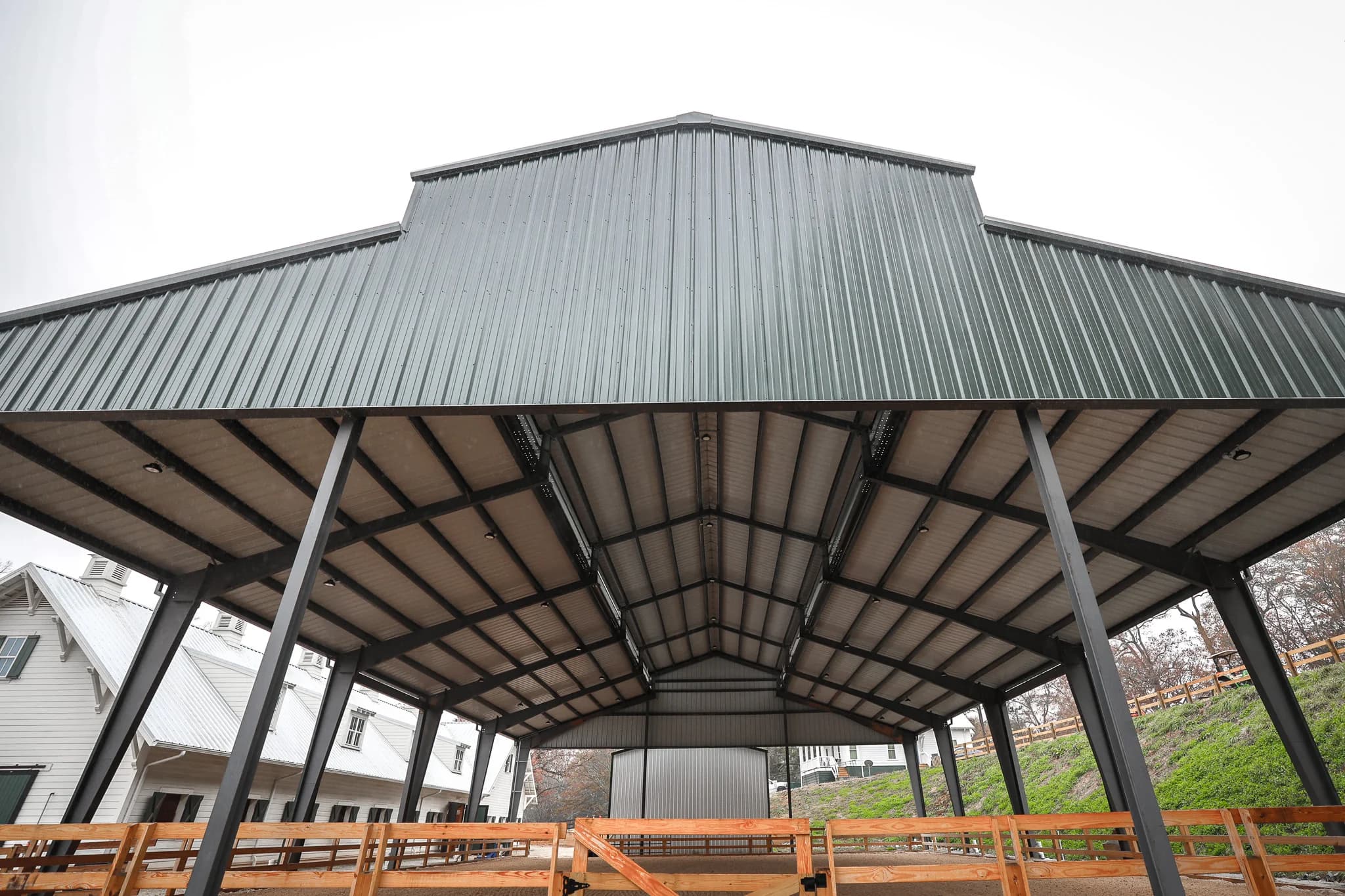 Steel arena front view showing monitor-style roofline