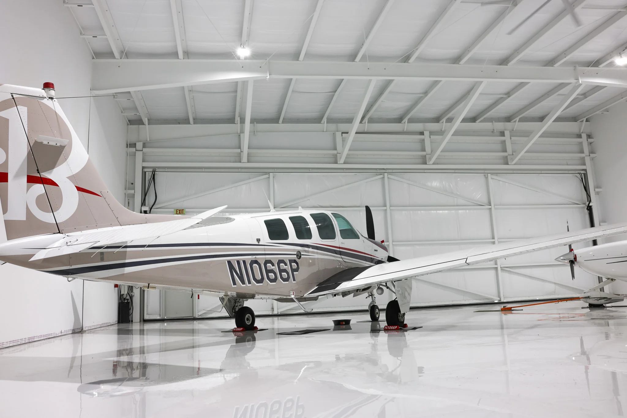 Beechcraft Bonanza N1066P in finished steel hangar