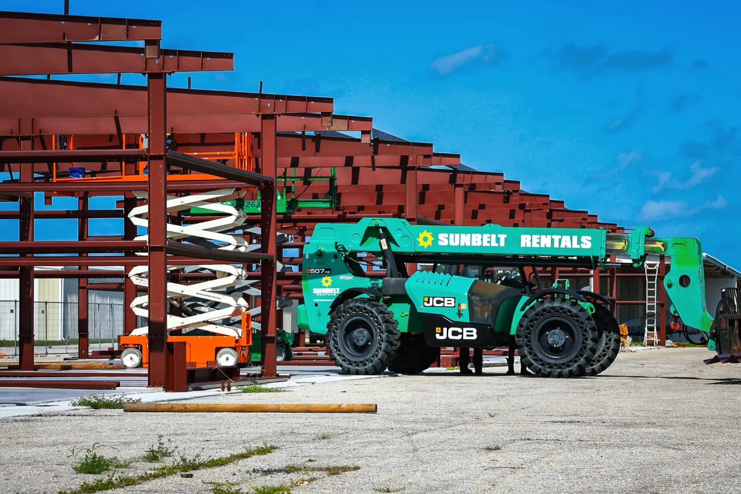 Welded steel frame structure with purlins and girts installed