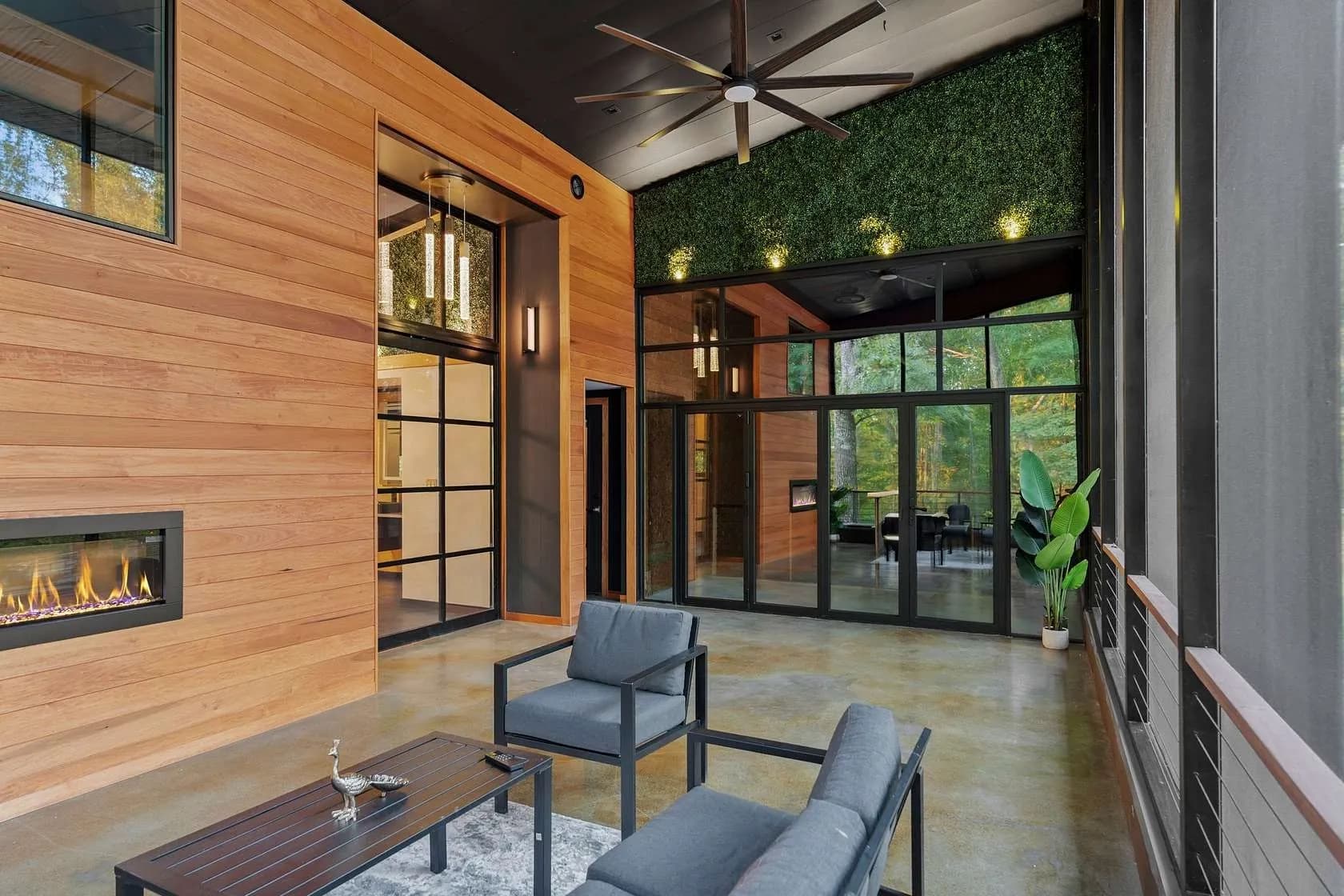 Great room with stone fireplace and vaulted ceiling