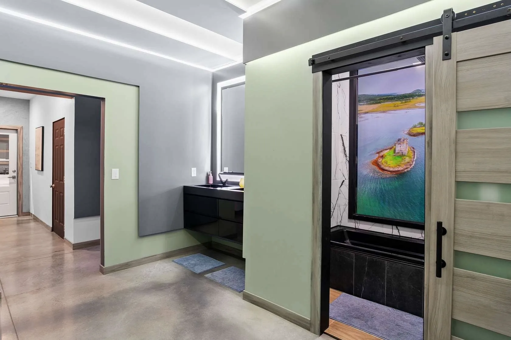 Hallway with sliding barn door accent